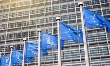 European Union flags in front of the Berlaymont